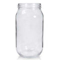 Empty clear glass jar with a wide threaded neck, shown without a lid